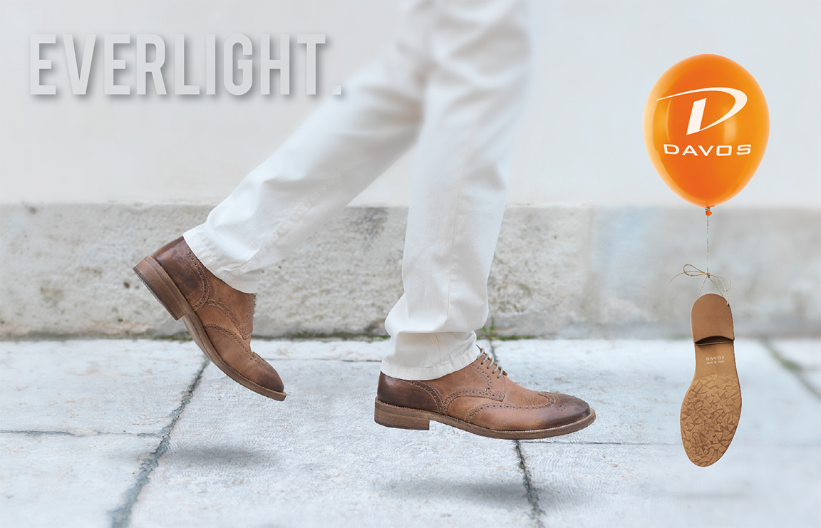 A man walking in brown brogues beside an Everlight sole tied to a Davos balloon