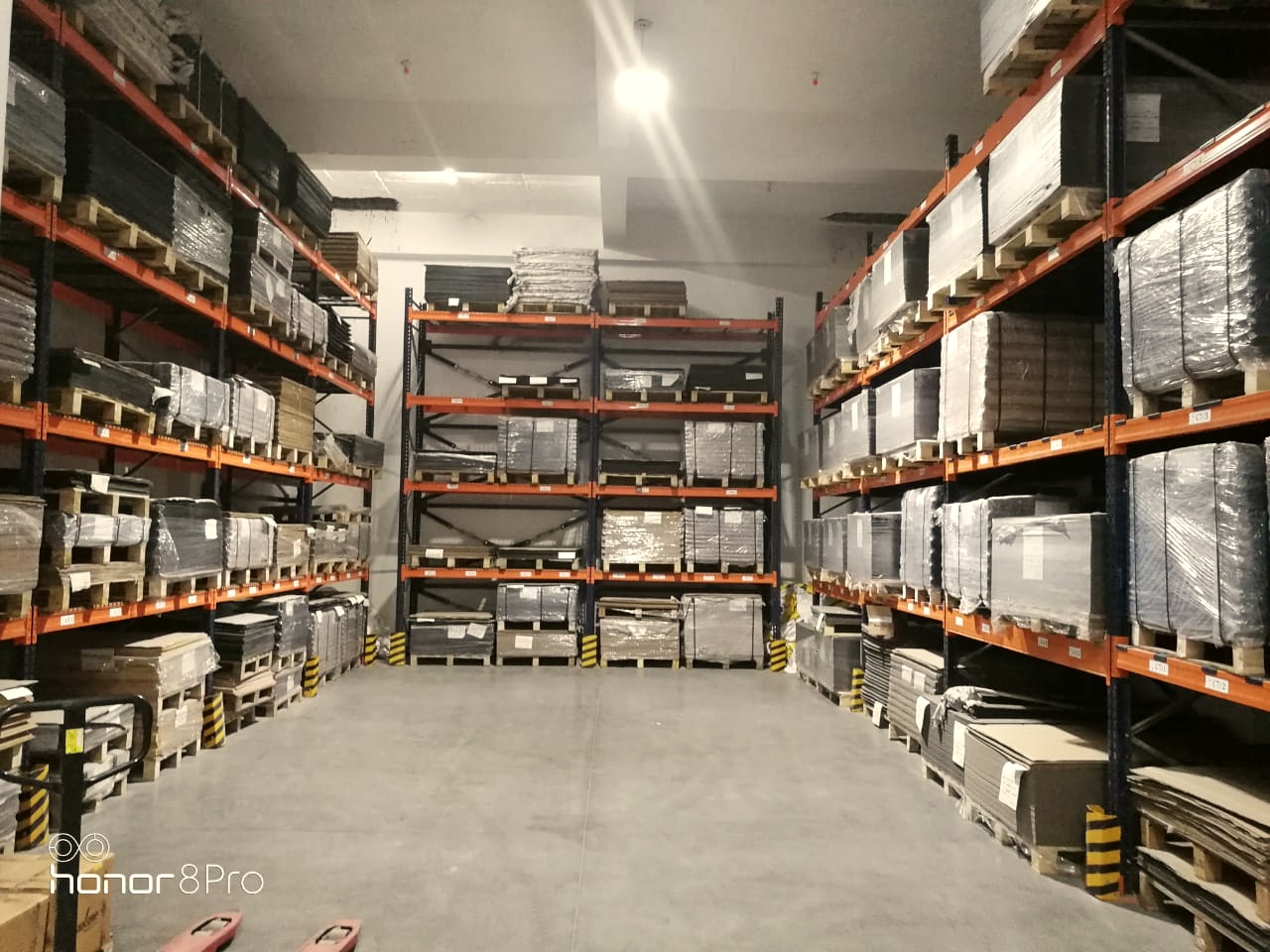Davos rubber sheet and Merckens shankboard stock racked at the Instyle warehouse in Dwarka, Delhi