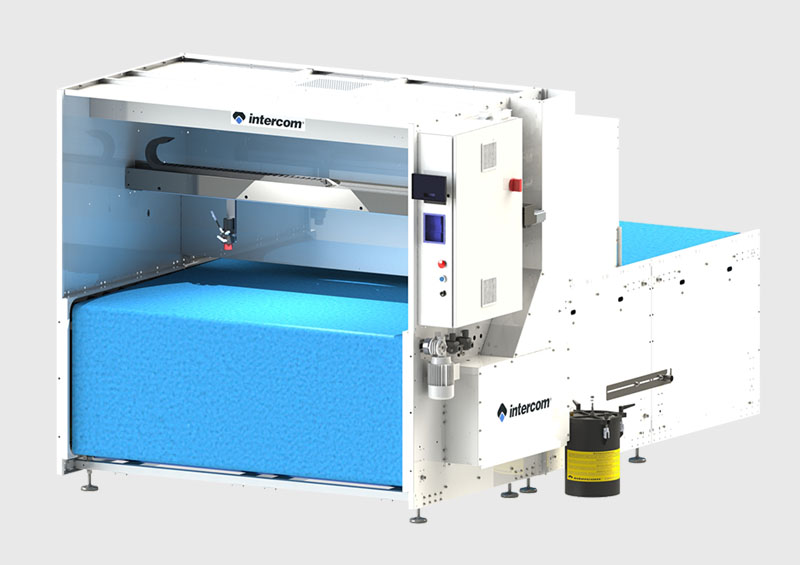 Intercom automatic spray-bonding machine, built to run Ecostick® water-based adhesives