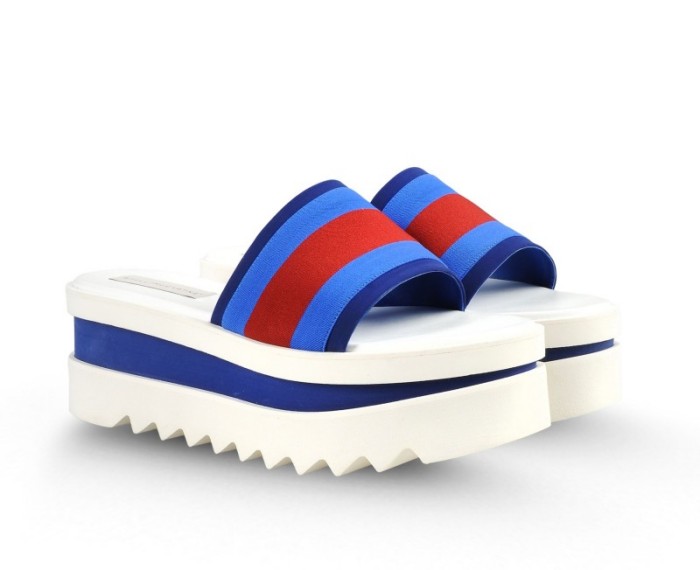 Flatform slide with red and blue striped elastic bands